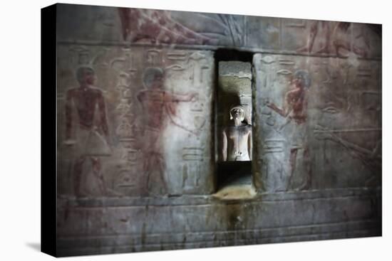 A Statue Through a Window in a Bas Relief Covered Wall in the Tomb of Ti-Alex Saberi-Premier Image Canvas