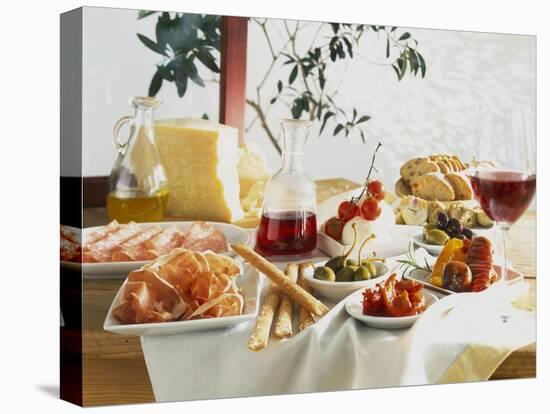 A Table Laid with Antipasti and Red Wine-Ulrike Koeb-Premier Image Canvas