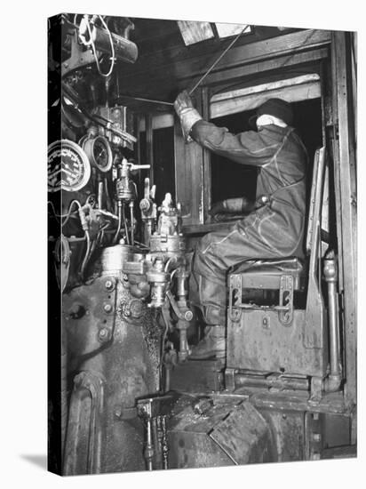 A View of a Santa Fe Railroad Freight Train Conductor Pulling the Whistle Cord-Bernard Hoffman-Premier Image Canvas