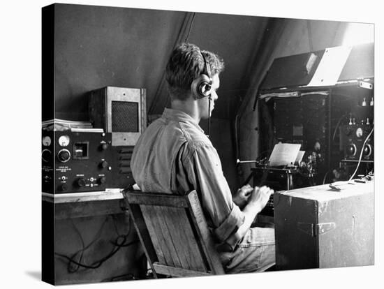 A View of a Soldier Using Communications Equipment During US Army Maneuvers-John Phillips-Premier Image Canvas