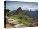 A wide angle photo of Macchu Pichu at sunrise with dramatic clouds in the distance.-Alex Saberi-Premier Image Canvas