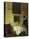 A Woman by a Dining Table-Carl Holsoe-Premier Image Canvas