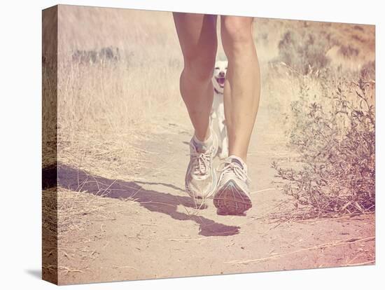 A Woman Running on a Trail with a Dog-graphicphoto-Premier Image Canvas