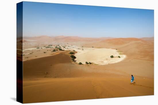 A Woman Runs Down from the Summit of Sossusvlei Sand Dune, Namibia, Africa-Alex Treadway-Premier Image Canvas