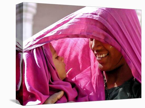 A Woman Shields Her Child from the Sun Using Her Scarf-null-Premier Image Canvas