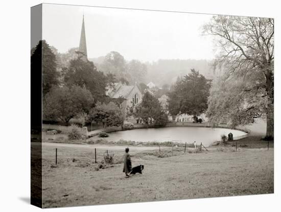 A Woman Walking Her Border Collie Dog in the Countryside-null-Premier Image Canvas