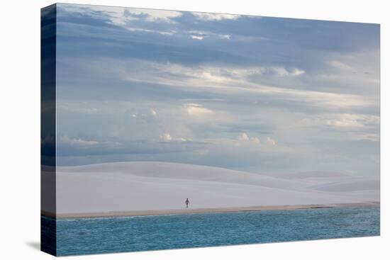 A Woman Walks across the Dunes in Brazil's Lencois Maranhenses National Park-Alex Saberi-Premier Image Canvas