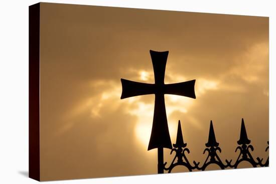 A wrought-iron cross on a fence in Syria at sunrise.-Emily Wilson-Premier Image Canvas