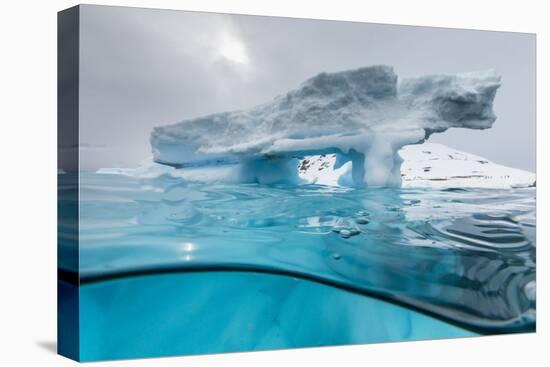 Above and below view of an arch formed in an iceberg at Cuverville Island, Ererra Channel-Michael Nolan-Premier Image Canvas