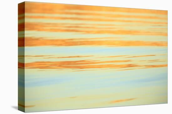 Abstract of water ripples in orange and blue.-Stuart Westmorland-Premier Image Canvas