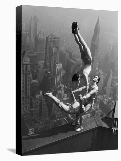 Acrobats Performing on the Empire State Building-null-Premier Image Canvas