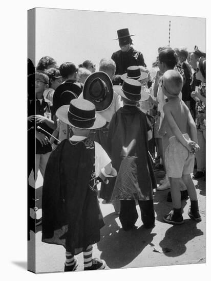 Actor Guy Williams as Zorro Signing Autographs for Fans at Disneyland-Allan Grant-Premier Image Canvas
