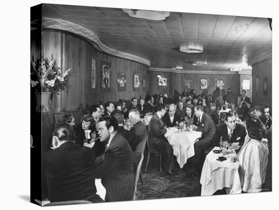 Actor Orson Welles at Table on Left with Cigar in His Mouth-Alfred Eisenstaedt-Premier Image Canvas