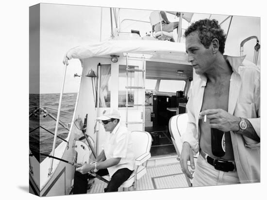 Actor Paul Newman Fishing with a Friend-Mark Kauffman-Premier Image Canvas