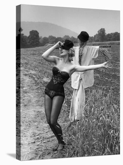 Actress and Dancer Julie Newmar Warming Up for Her Devil's Role in the Musical "Damn Yankees"-Nina Leen-Premier Image Canvas