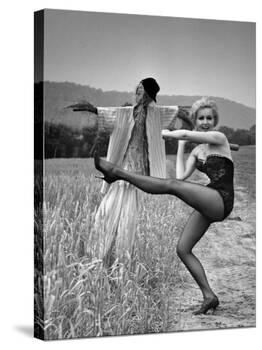 Actress and Dancer Julie Newmar Warming Up for Her Devil's Role in the Musical "Damn Yankees"-Nina Leen-Premier Image Canvas