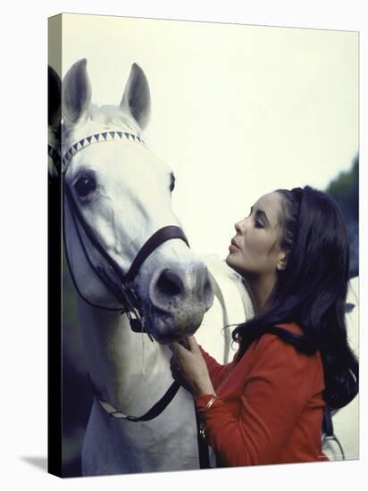 Actress Elizabeth Taylor with Horse During Filming of "Reflections in a Golden Eye"-Loomis Dean-Premier Image Canvas