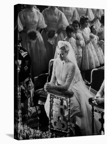 Actress Grace Kelly in Gorgeous Wedding Gown Praying During Her Wedding to Prince Rainier-Thomas D^ Mcavoy-Premier Image Canvas