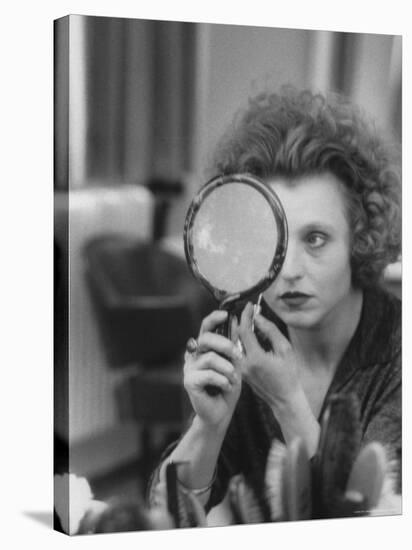 Actress Hanna Schygulla Looking in Hand Mirror While Applying Makeup-Alfred Eisenstaedt-Premier Image Canvas