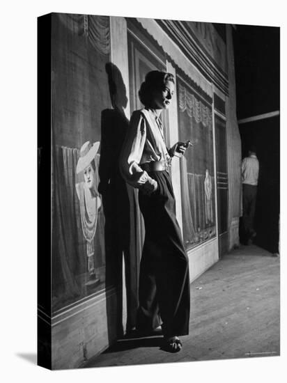 Actress Lauren Bacall Smoking a Cigarette on the Set of Film, "Young Man with a Horn"-Alfred Eisenstaedt-Premier Image Canvas