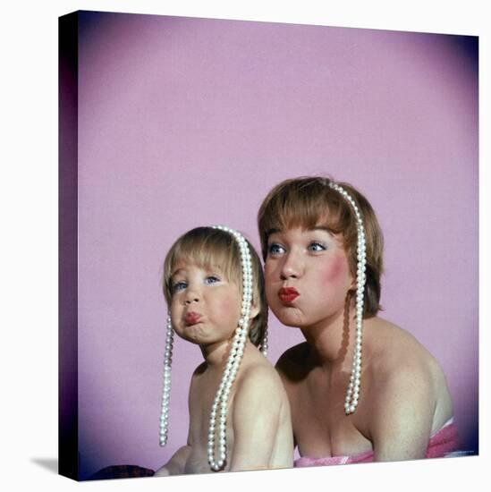 Actress Shirley MacLaine and Daughter Sachi Parker Pouting with String of Pearls on Their Heads-Allan Grant-Premier Image Canvas