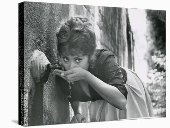Actress Sophia Loren Drinking Water from Spigot During the Filming of Madame Sans Gene-Alfred Eisenstaedt-Premier Image Canvas
