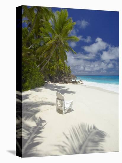 Adirondack Chair and Tropical Beach, Seychelles, Indian Ocean, Africa-Sakis Papadopoulos-Premier Image Canvas