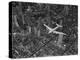 Aerial View of a Dc-4 Passenger Plane in Flight over Manhattan-Margaret Bourke-White-Premier Image Canvas