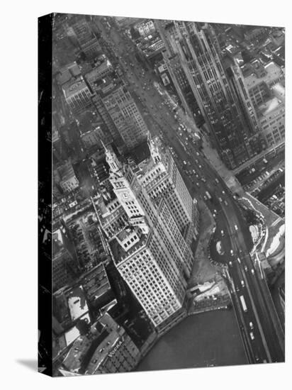 Aerial View of Buildings and a Bridge Crossing a River Flowing Through the City-Margaret Bourke-White-Premier Image Canvas