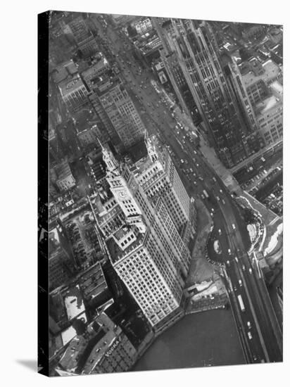 Aerial View of Buildings and a Bridge Crossing a River Flowing Through the City-Margaret Bourke-White-Premier Image Canvas