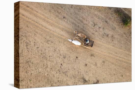 Aerial View of Farmer on Dirt Road in Bagan, Myanmar-Harry Marx-Premier Image Canvas