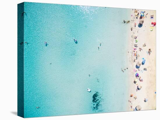 Aerial View of Sandy Beach with Tourists Swimming in Beautiful Clear Sea Water-paul prescott-Premier Image Canvas