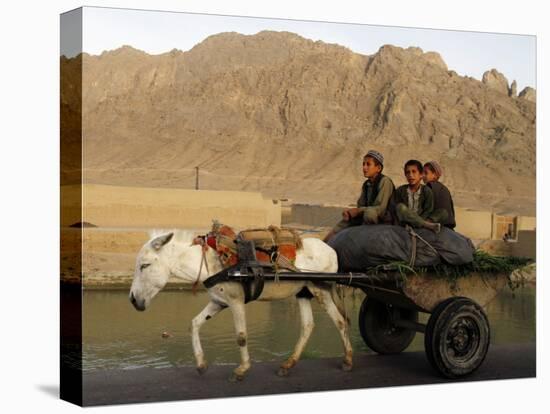 Afghan Kids Ride on a Horse Carriage in Kandahar City, Afghanistan-null-Premier Image Canvas