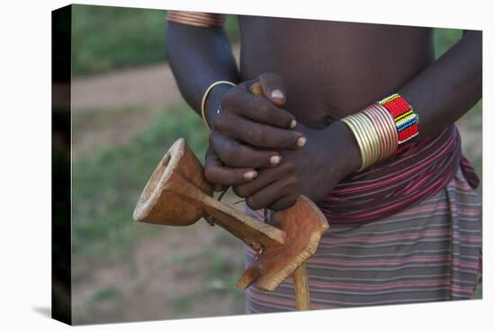 Africa, Ethiopia, South Omo, Hamer tribe. Hamer man with his traditional stool.-Ellen Goff-Premier Image Canvas