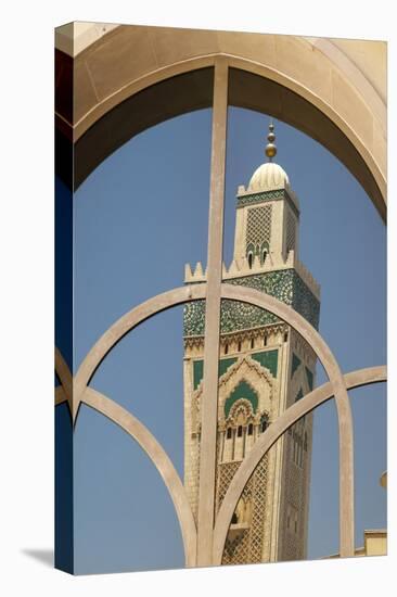 Africa, Morocco, Casablanca. the Minaret of Hassan Ii Mosque Is Reflected in a Window-Brenda Tharp-Premier Image Canvas
