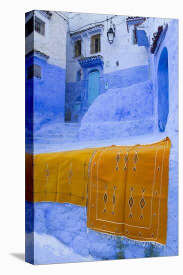 Africa, Morocco, Chefchaouen. Rugs Draped on a Wall in the Blue Town-Brenda Tharp-Premier Image Canvas