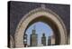 Africa, Morocco, Fes. an Arch with Classic Moorish Decor Frames Two Minarets-Brenda Tharp-Premier Image Canvas