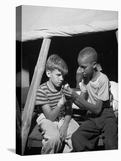 African American Camper Helps a White Bubby with His Bandaged Hand-Gordon Parks-Stretched Canvas
