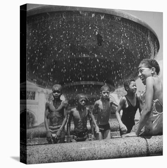 African American Children Playing in a Fountain-Marie Hansen-Premier Image Canvas