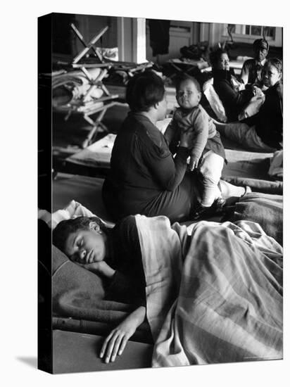 African American Refugees Left Homeless After Severe Flooding Sleep in Temporary Relief Station-Margaret Bourke-White-Premier Image Canvas