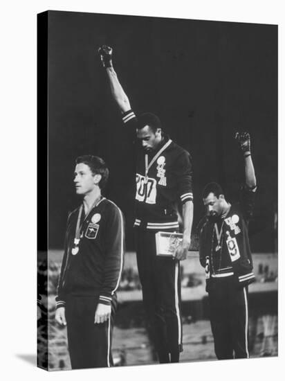 African-American Track Stars Tommie Smith and John Carlos after Winning Olympic Medals-John Dominis-Premier Image Canvas