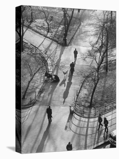 Afternoon Sunlight Casting Long Shadows in Washington Square Park-Yale Joel-Premier Image Canvas