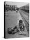 Aged Refugee Fighting Hunger, Sweeps Up Spilled Rice on the Railroad Station Platform-Jack Birns-Premier Image Canvas