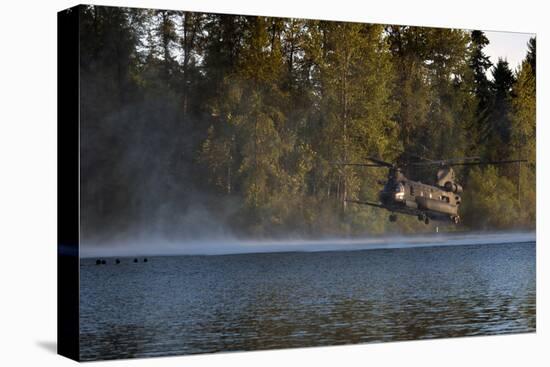 Airmen Wait in a Lake for an Mh-47 Chinook Helicopter to Extract Them-null-Premier Image Canvas