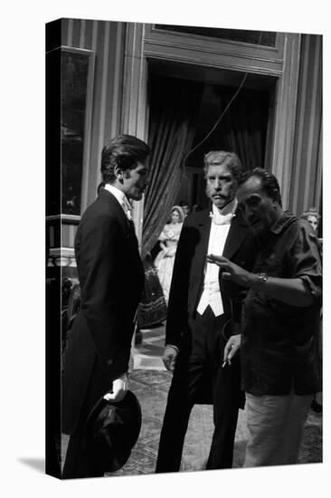 Alain Delon, Burt Lancaster and director Luchino Visconti on set of film "The Leopard", 1962 (b/w p-null-Stretched Canvas