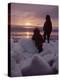 Alaska: Silhoutte of Native Alaskan Children Watching the Midnight Sun-Ralph Crane-Premier Image Canvas