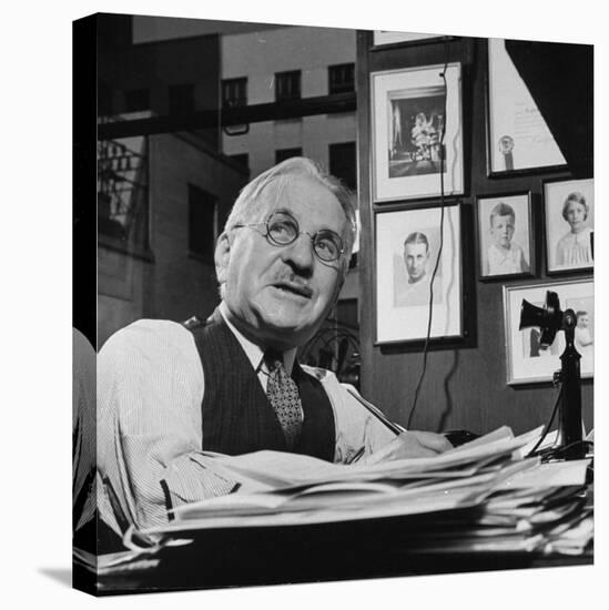 Albert Kahn Sitting at a Desk-Bernard Hoffman-Premier Image Canvas