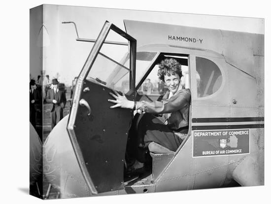 Amelia Earhart in an aeroplane, 1936-Harris & Ewing-Premier Image Canvas