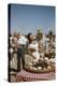 American Actor Rock Hudson Holds Actress Elizabeth Taylor While Filming 'Giant', Marfa, Texas, 1956-Allan Grant-Premier Image Canvas