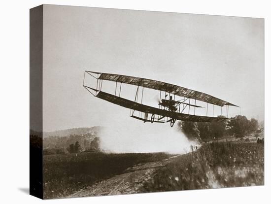 American aviator Glenn Curtiss making the first heavier-than-air flight in his 'June Bug', 1908-Edwin Levick-Premier Image Canvas